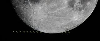 close up view of the moon with multiple exposures of Saturn going behind the moon then back into view.